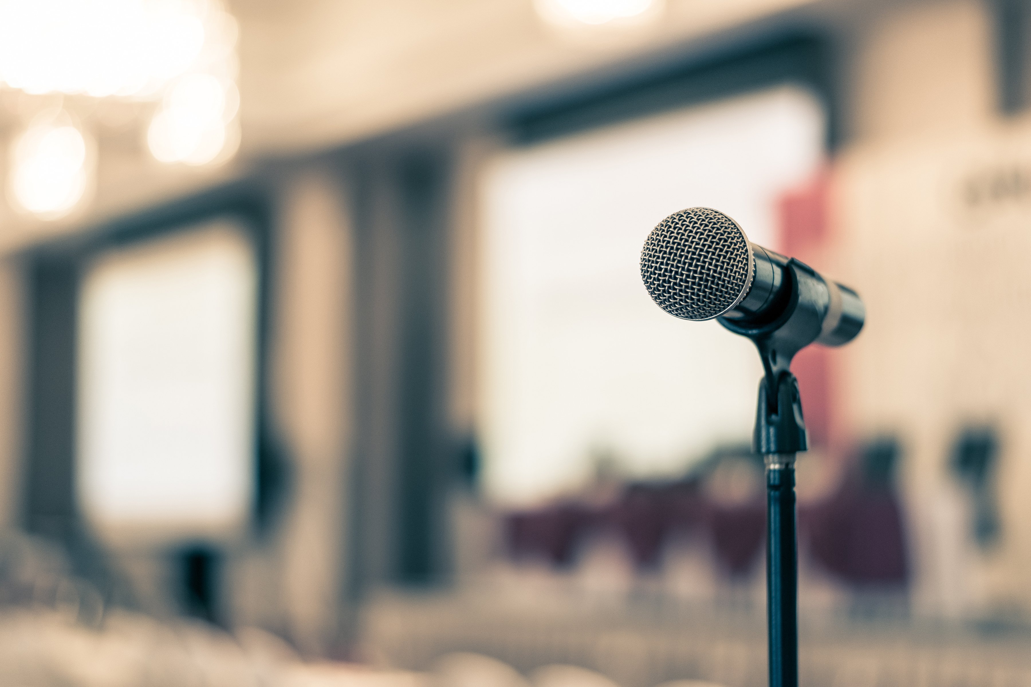 Microphone voice speaker in business seminar, speech presentation, town hall meeting, lecture hall or conference room in corporate or community event for host or public hearing